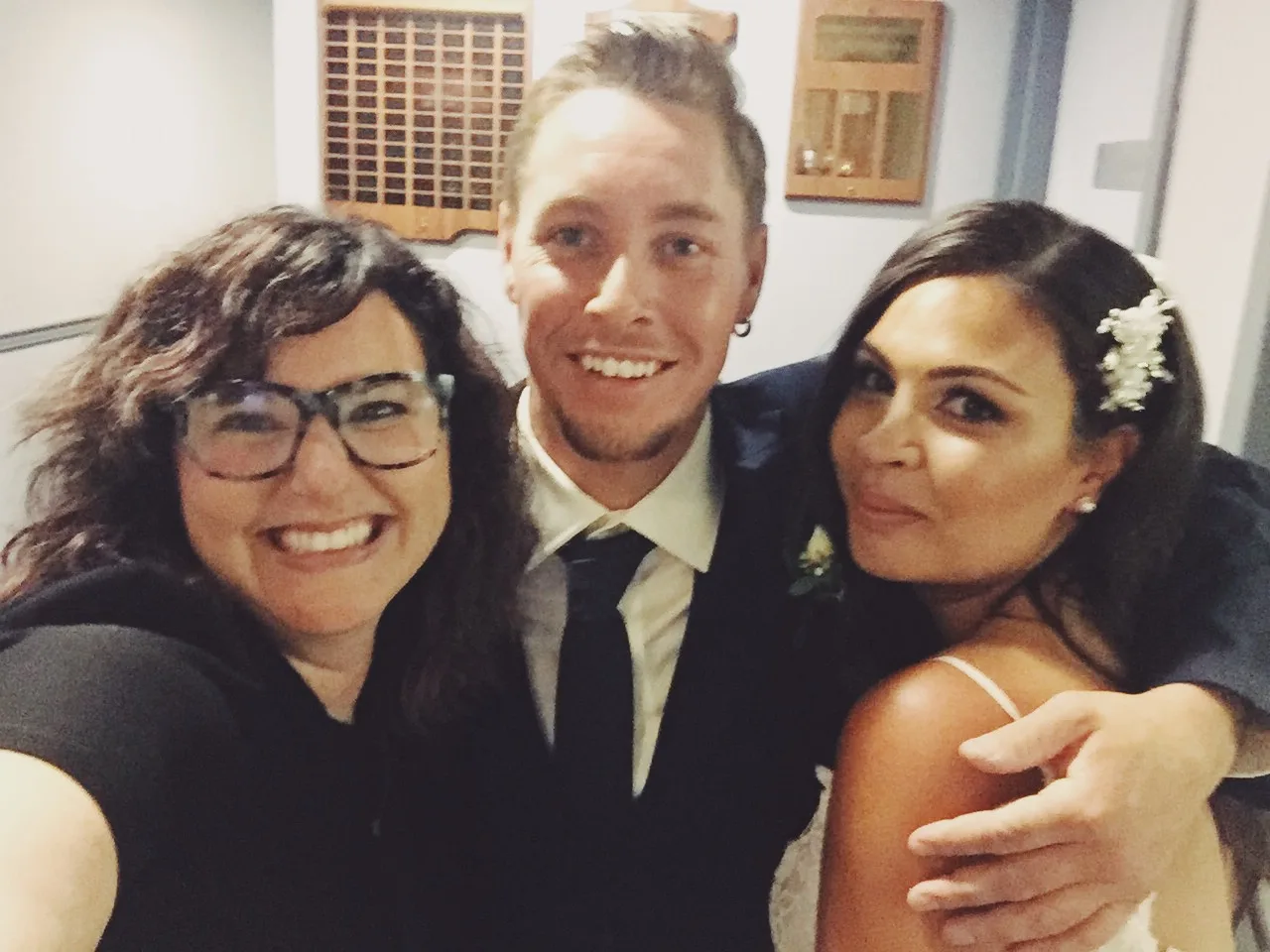 Selfie of Jordanna and Justin with officiant lani