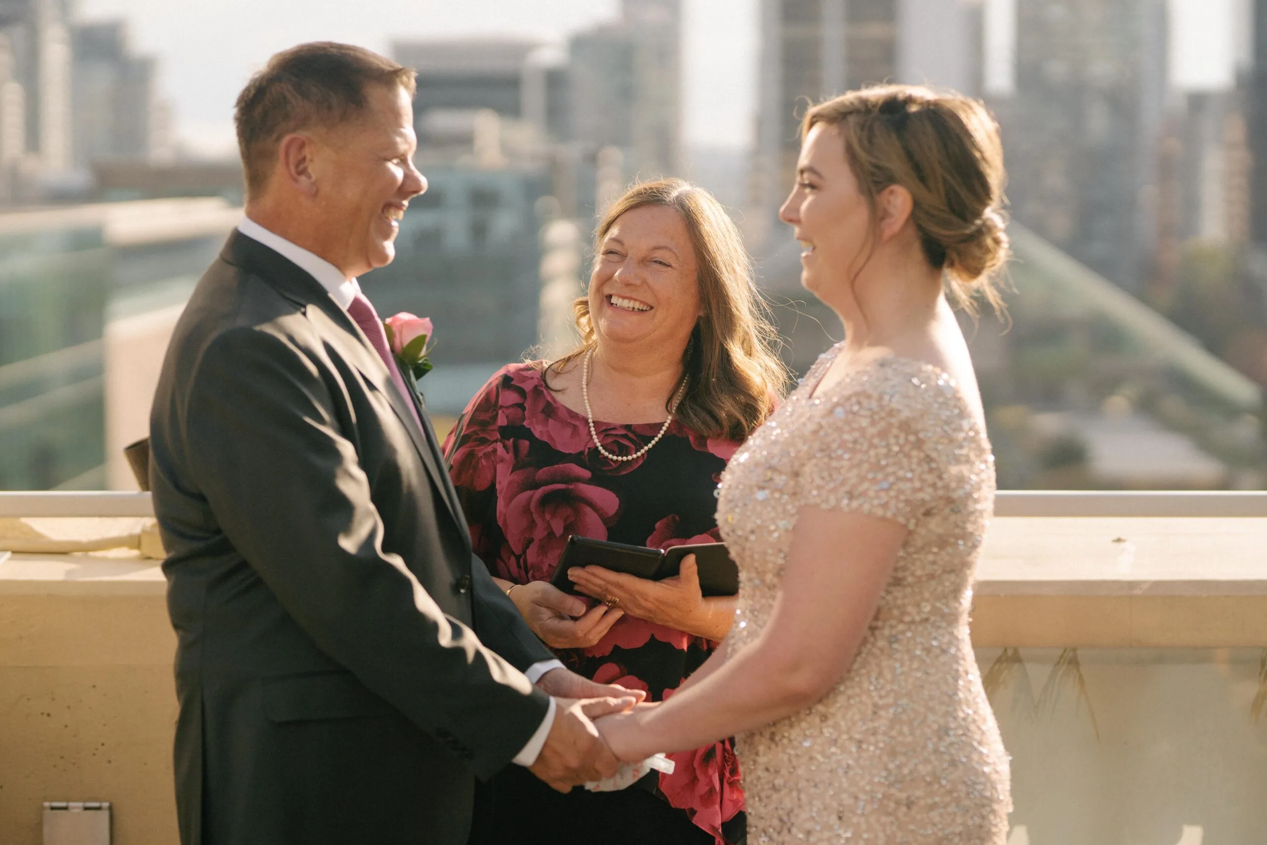 Dave & Nicole with Officiant Rhona during their rooftop ceremony