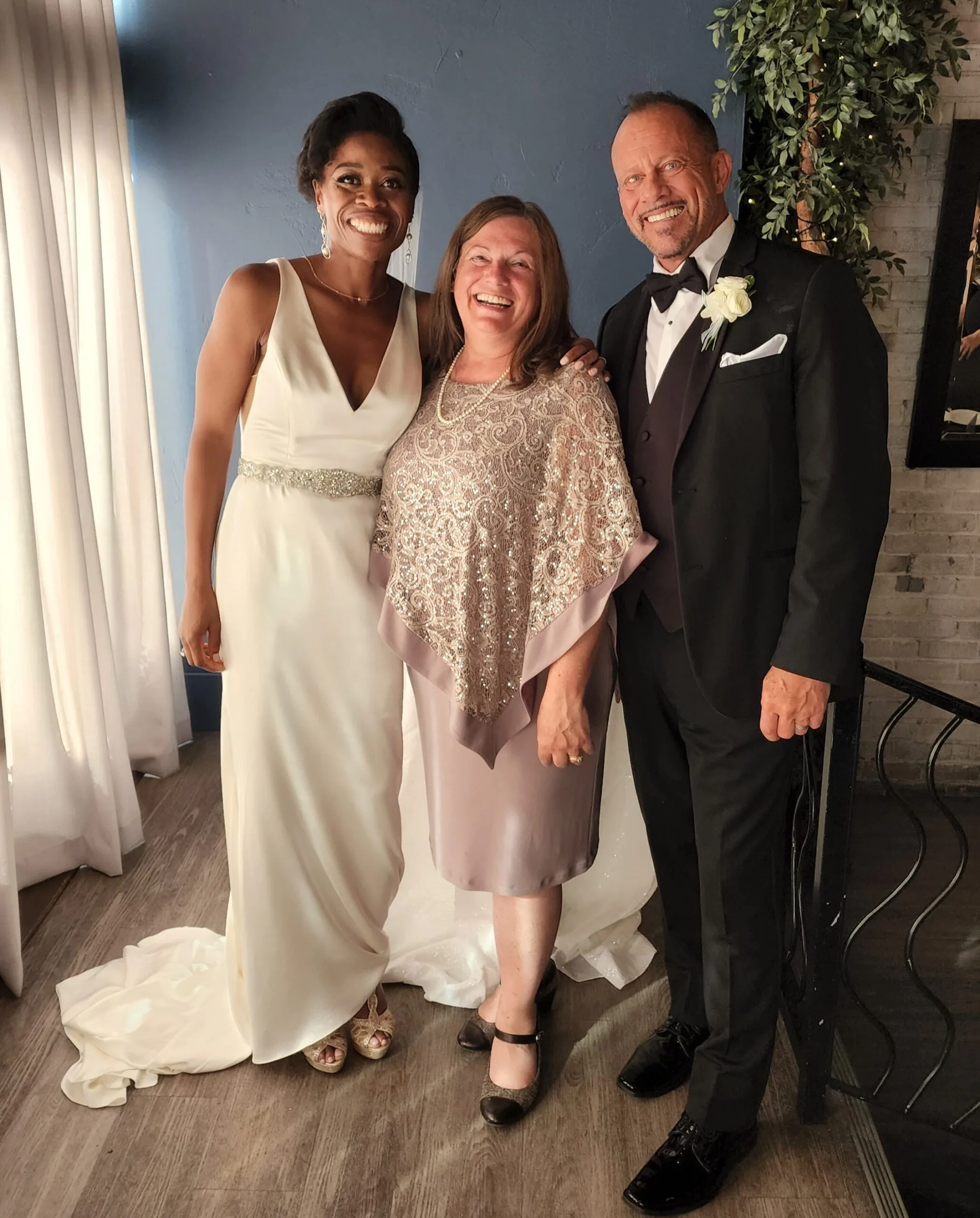 Adanma and Peter with Officiant Rhona after their ceremony