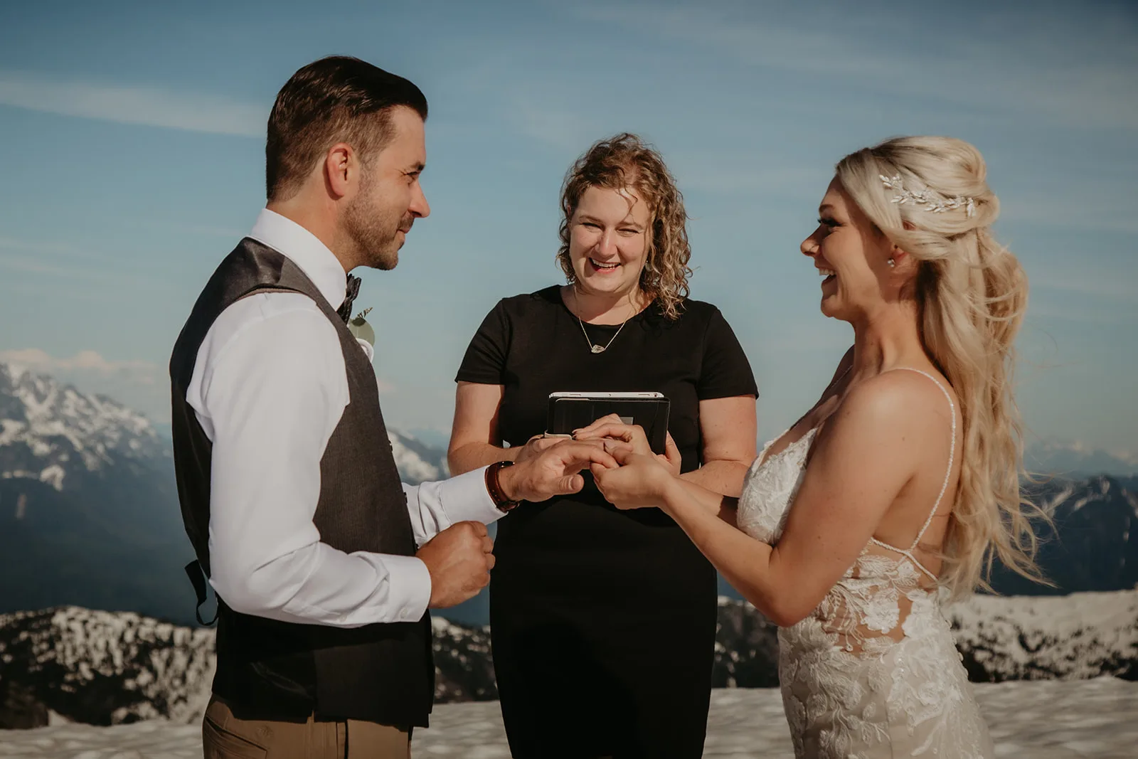 Young Hip & Married wedding officiant Shalom marrying a couple during a helicopter elopement