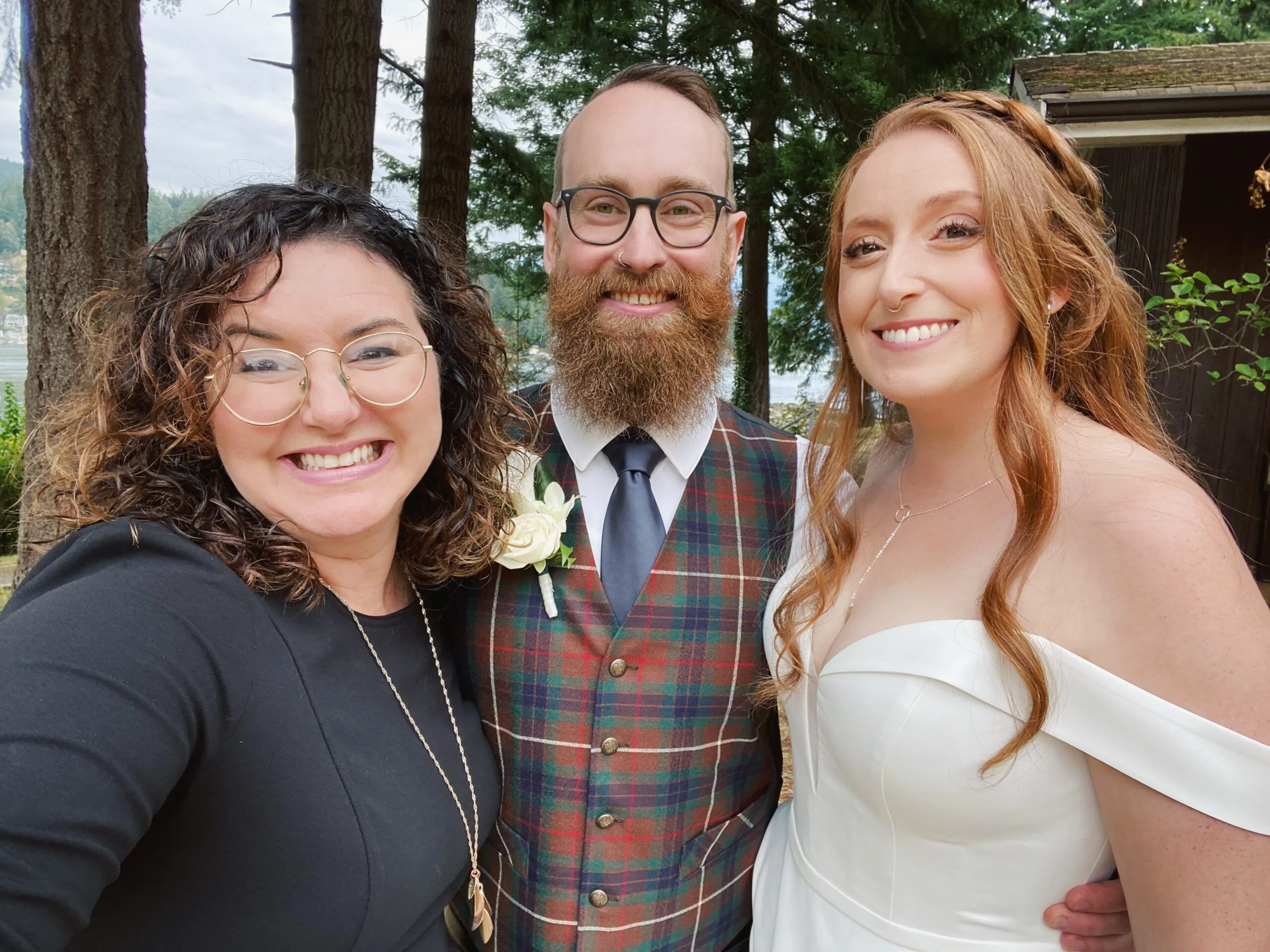 Officiant Lani taking a selfie with newlyweds Danny and Ian