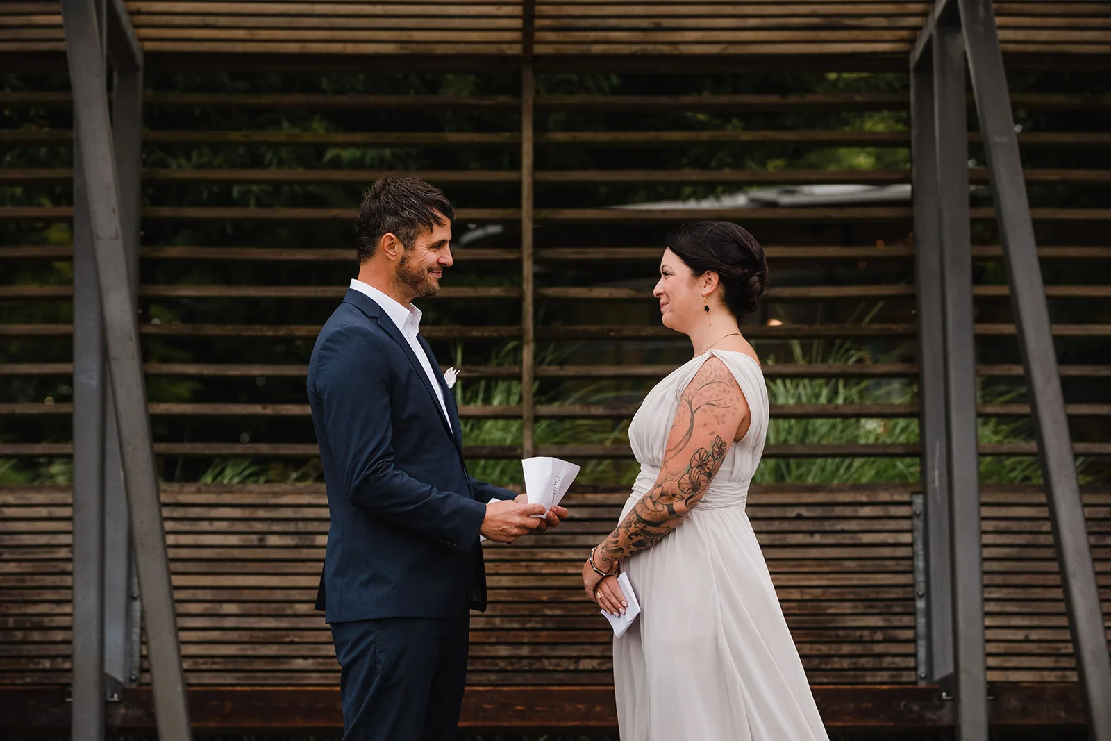 wedding vow renewal examples, couple during their vow exchange at Queen Elizabeth Park