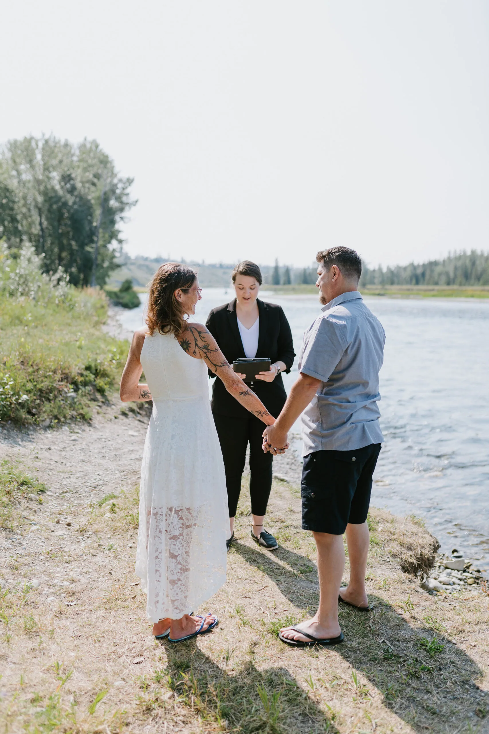 Marni and Tyler elopement at Fish Creek Park in Calgary with Young Hip & Married