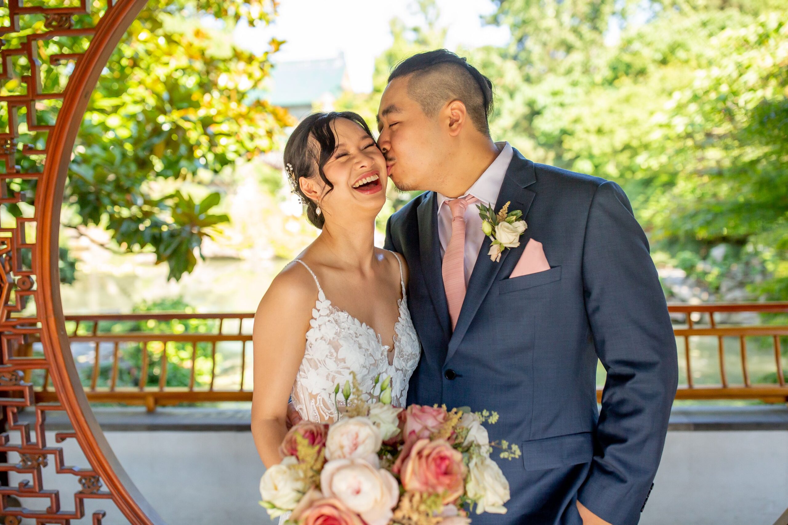 Couple kissing at Dr. Sun Yat-Sen Gardens