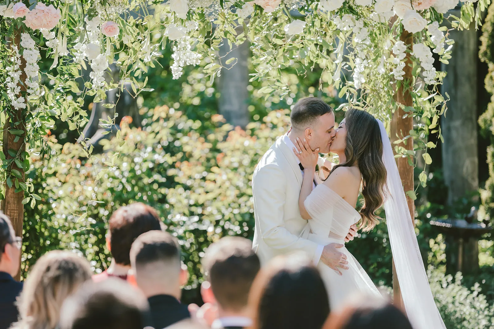 Bride and groom kissing after their Young Hip & Married ceremony