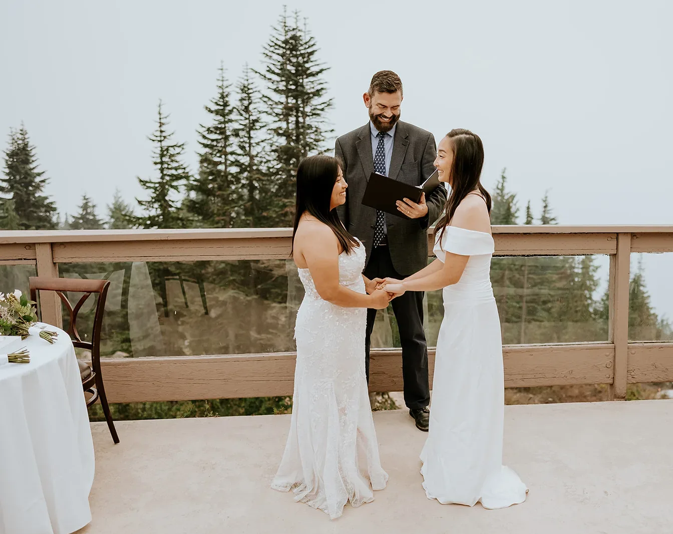 Officiant Curt marrying two brides at the top of Grouse Mountain