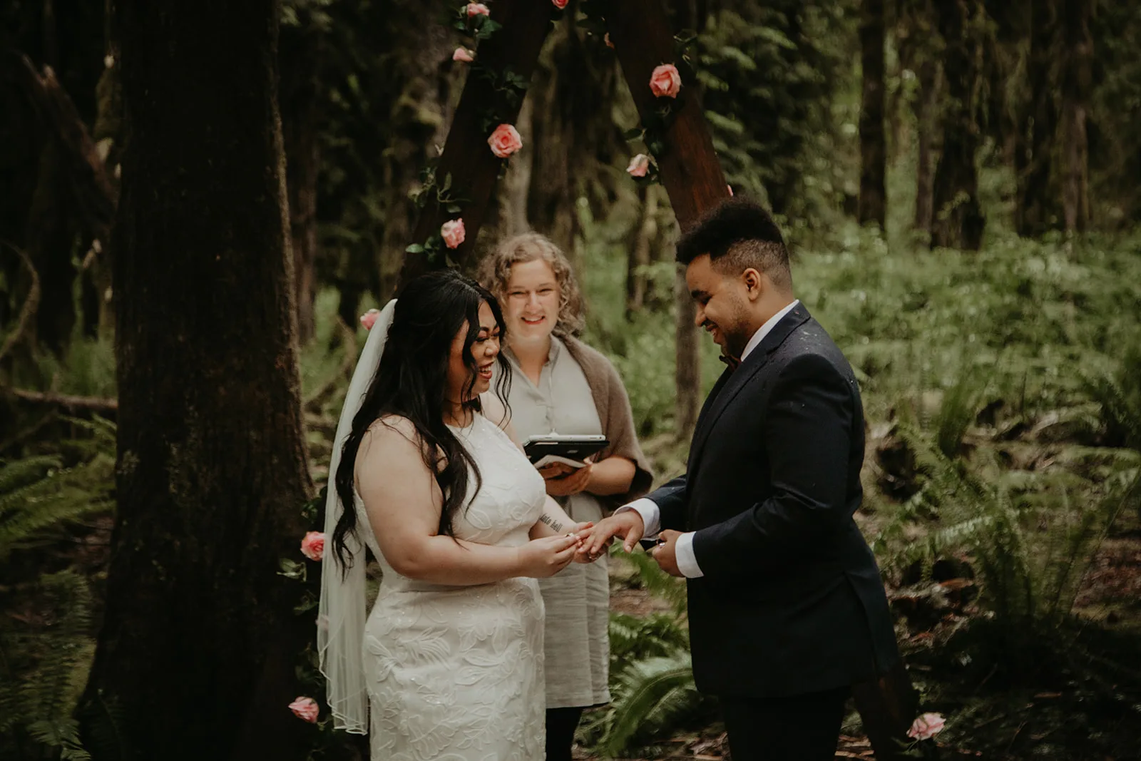 Couple exchanging rings during their Custom & Creative Ceremony with Officiant Shalom