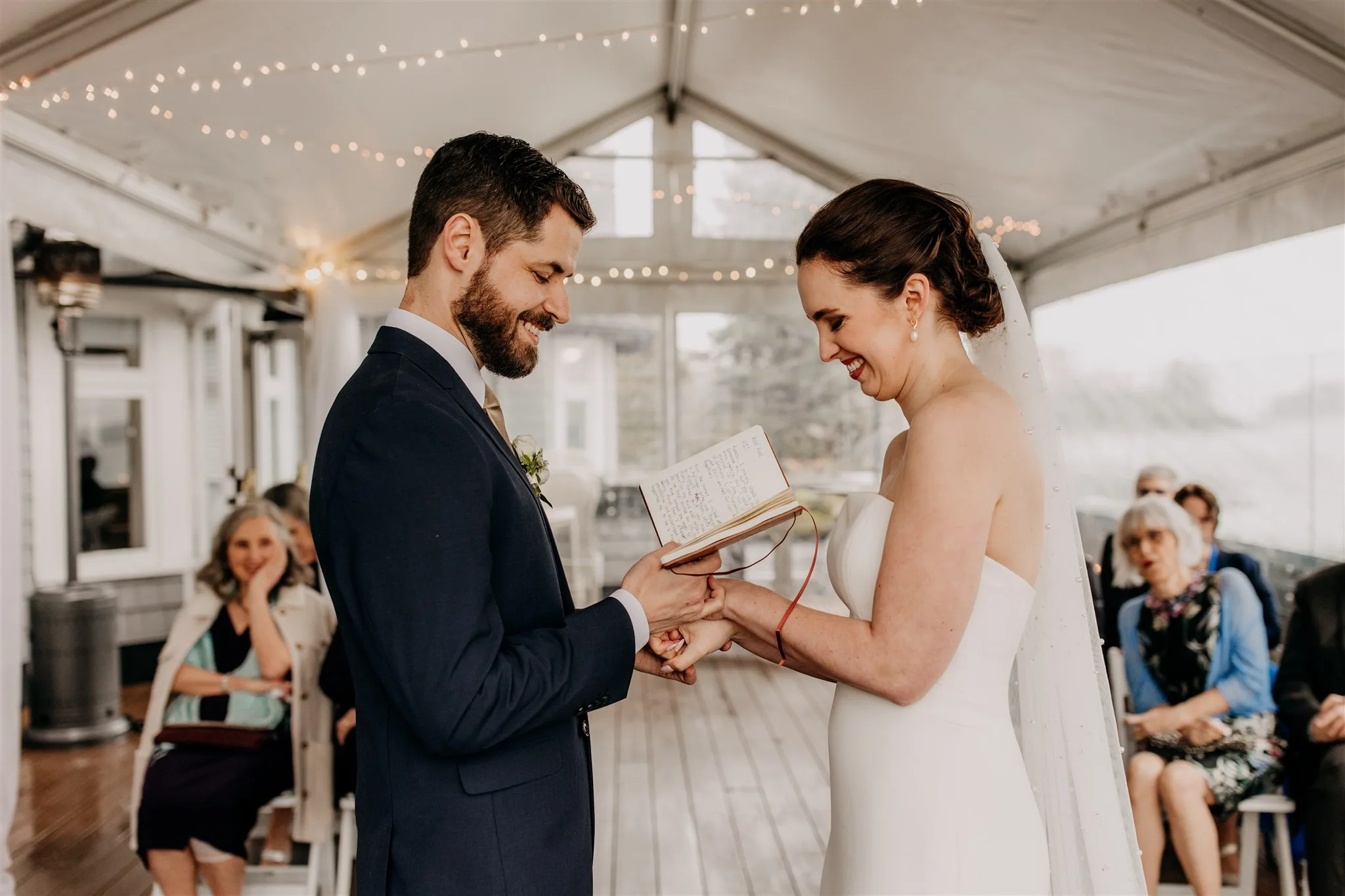newlywed couples exchanging vows while they hold hands