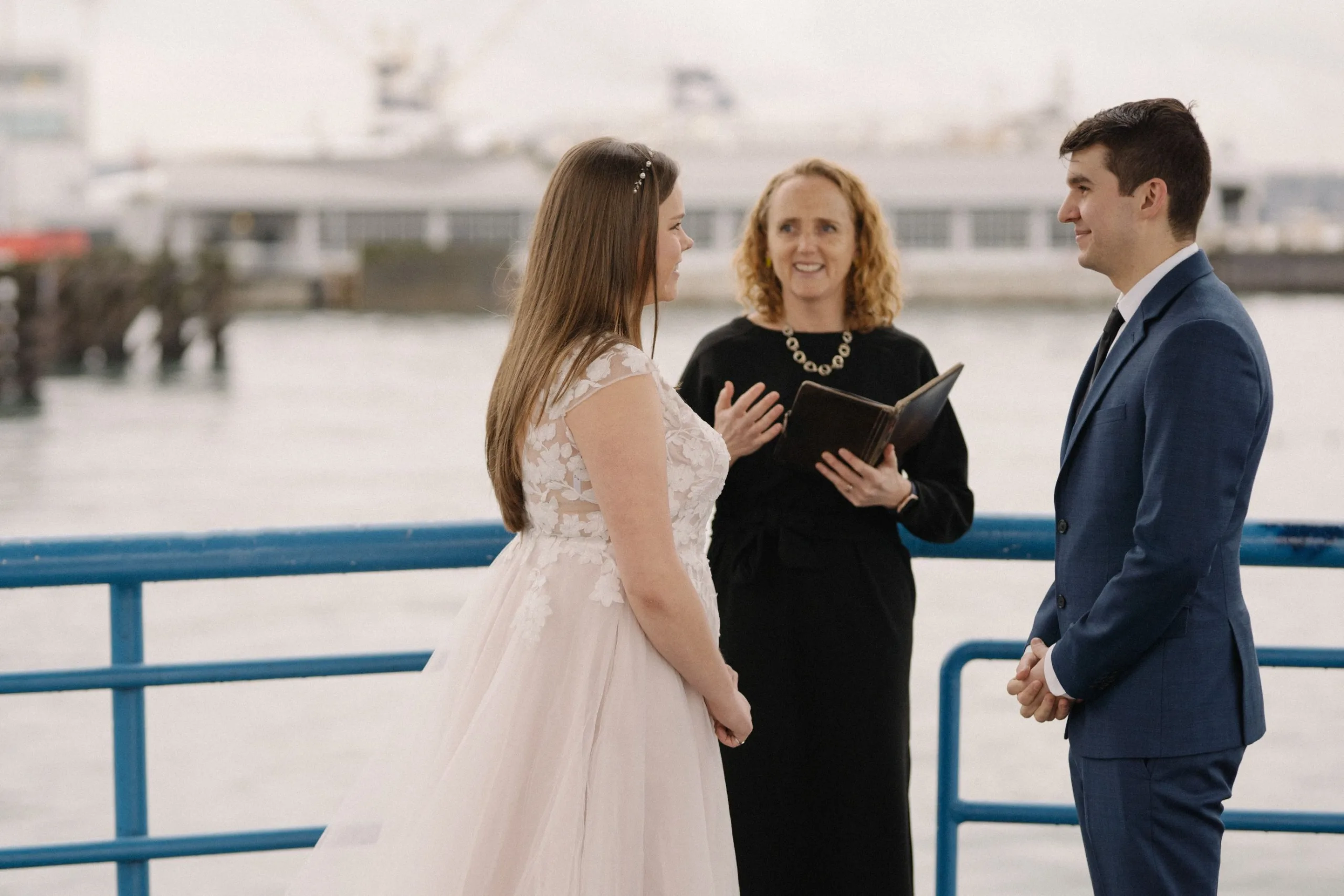 Amber and Christopher eloping at Lonsdale Quay with Officiant Jane