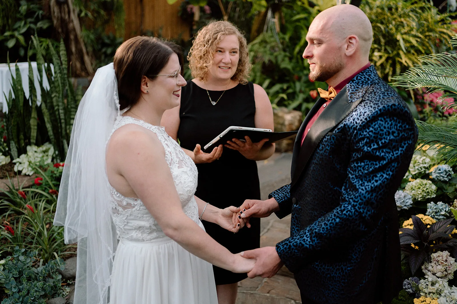 Officiant Shalom performing an elopement ceremony at Bloedel Conservatory