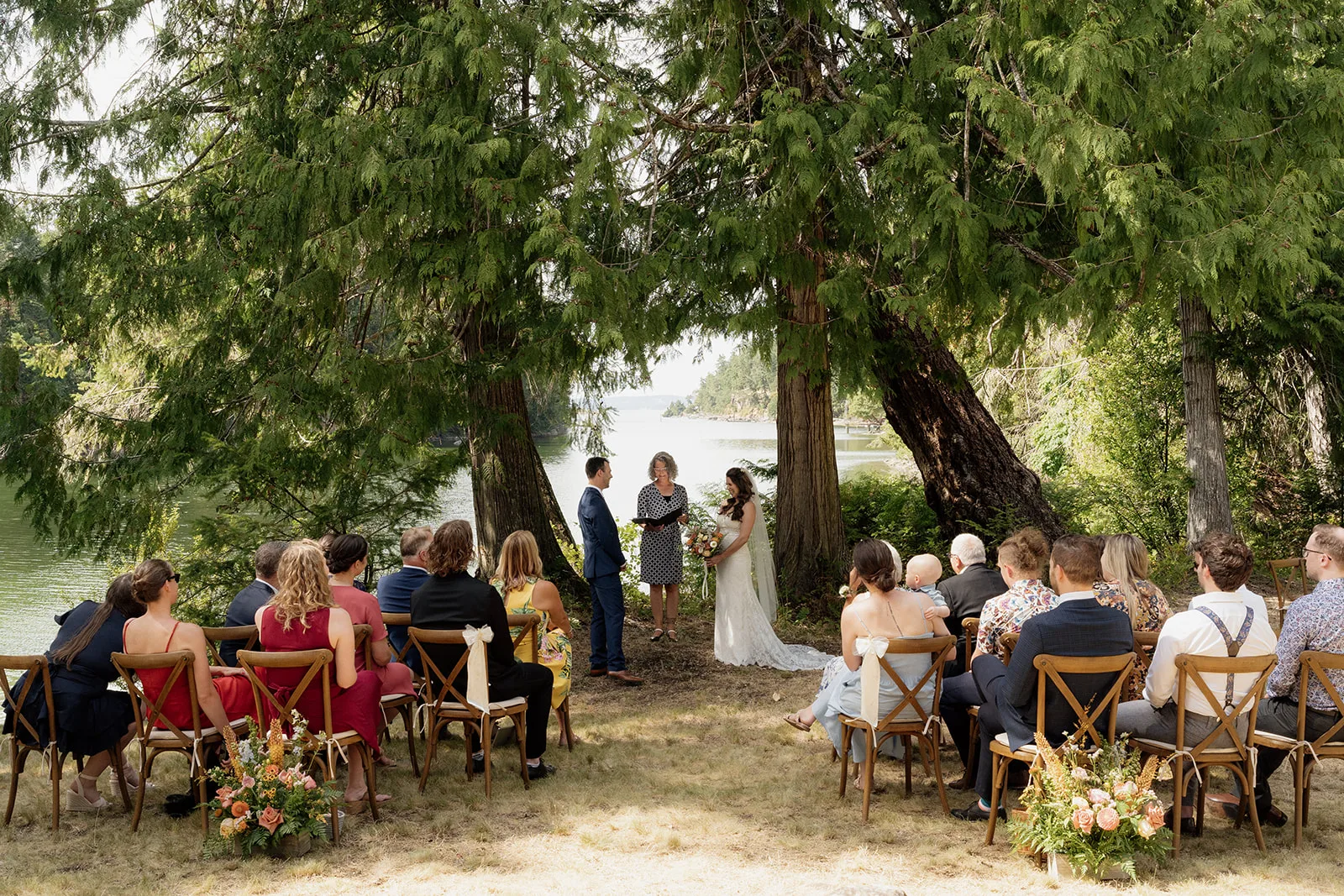 Officiant Amanda leading a ceremony under the trees on Vancouver Island