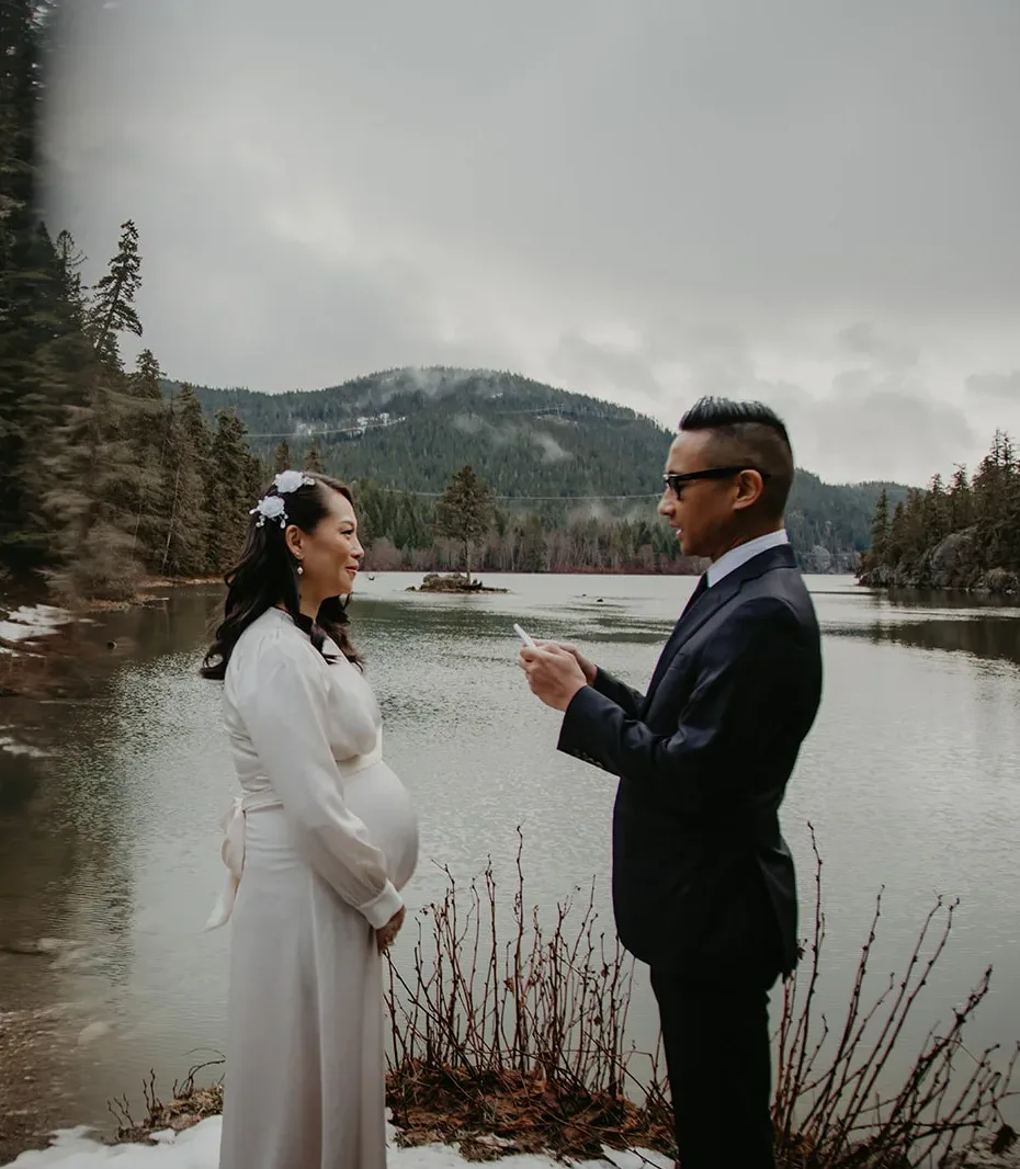 Bride and groom exchanging vows during their winter elopement