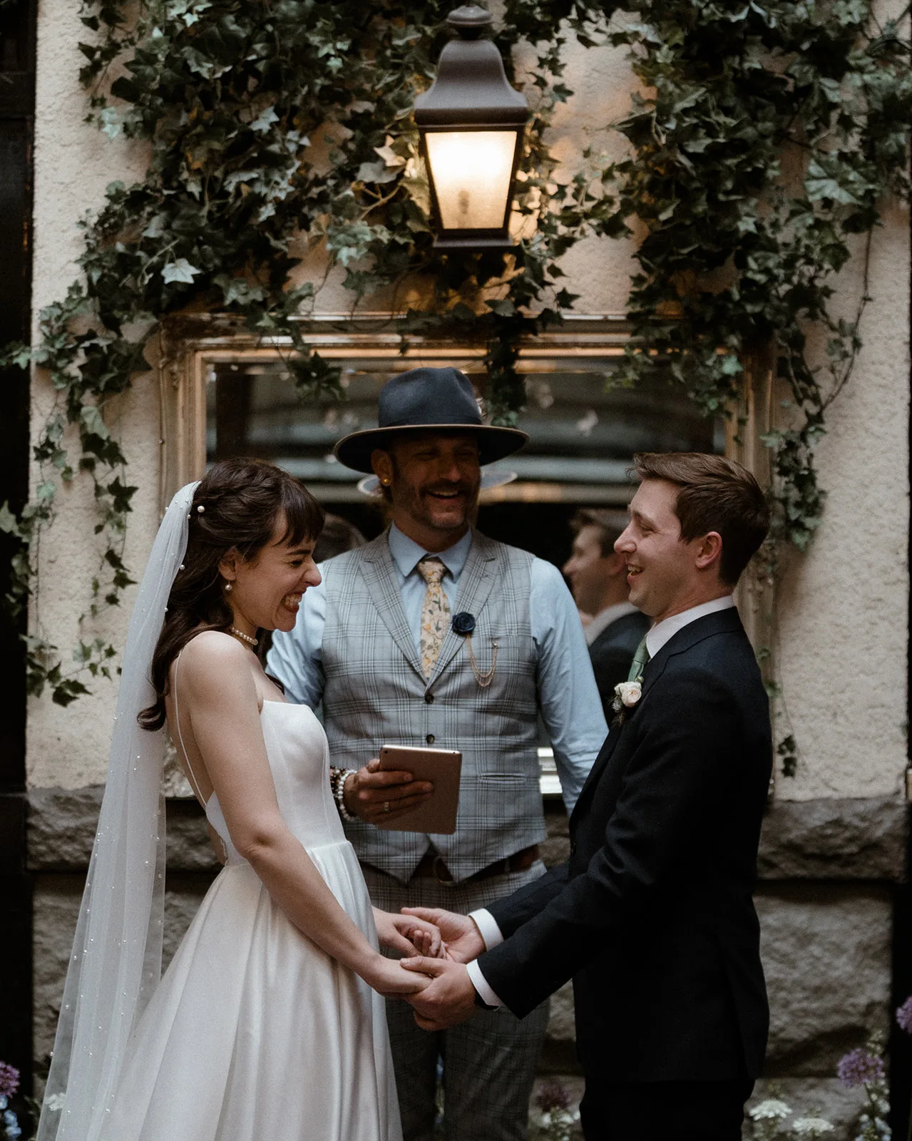 Julia and Alex during their ceremony with Officiant Shawn of Young Hip & Married