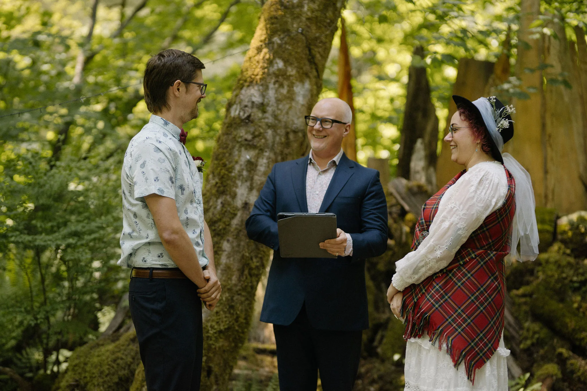 Courtney and Jeff with Officiant Lonnie for their Vancouver elopement, Clint Bargen Photography