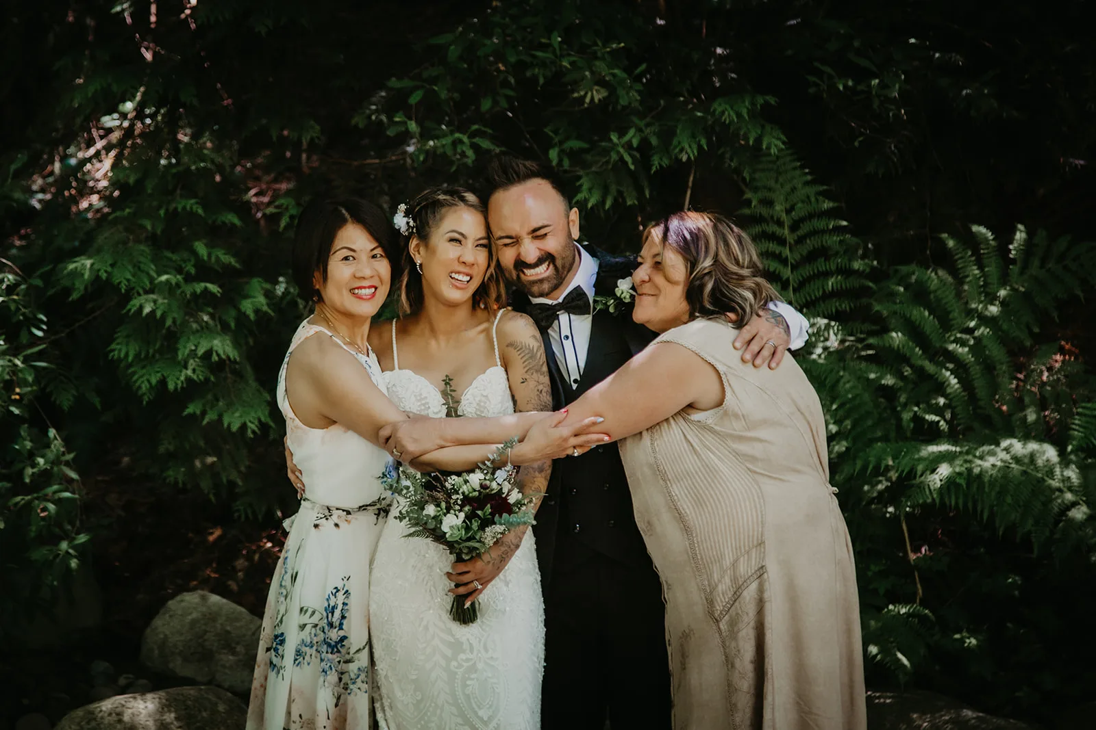 Kim & Robyn hugging their moms, Erica Miller Photography