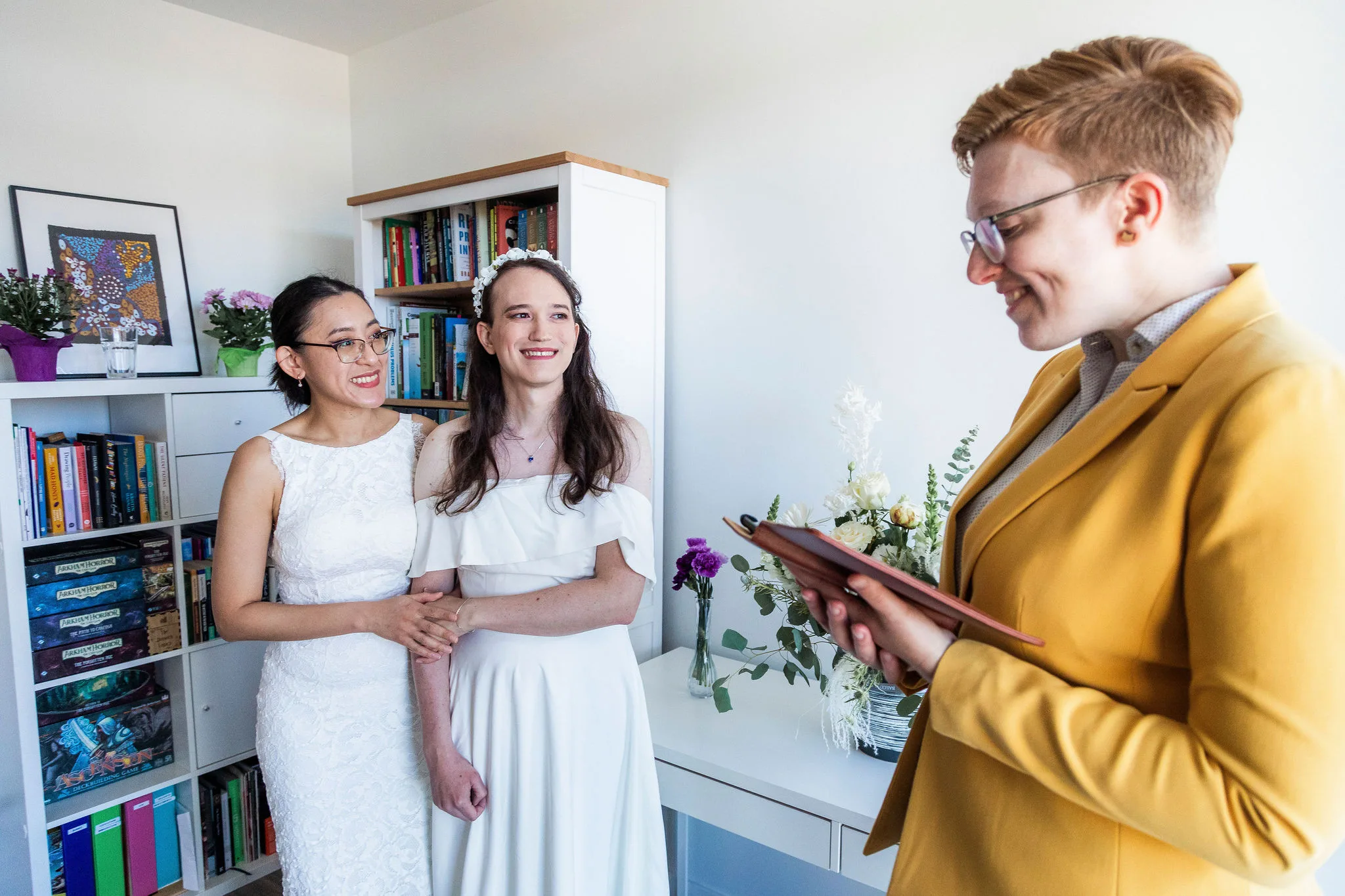 Amanda and Emily during their at home ceremony with Officiant Beth, John Bello Photography