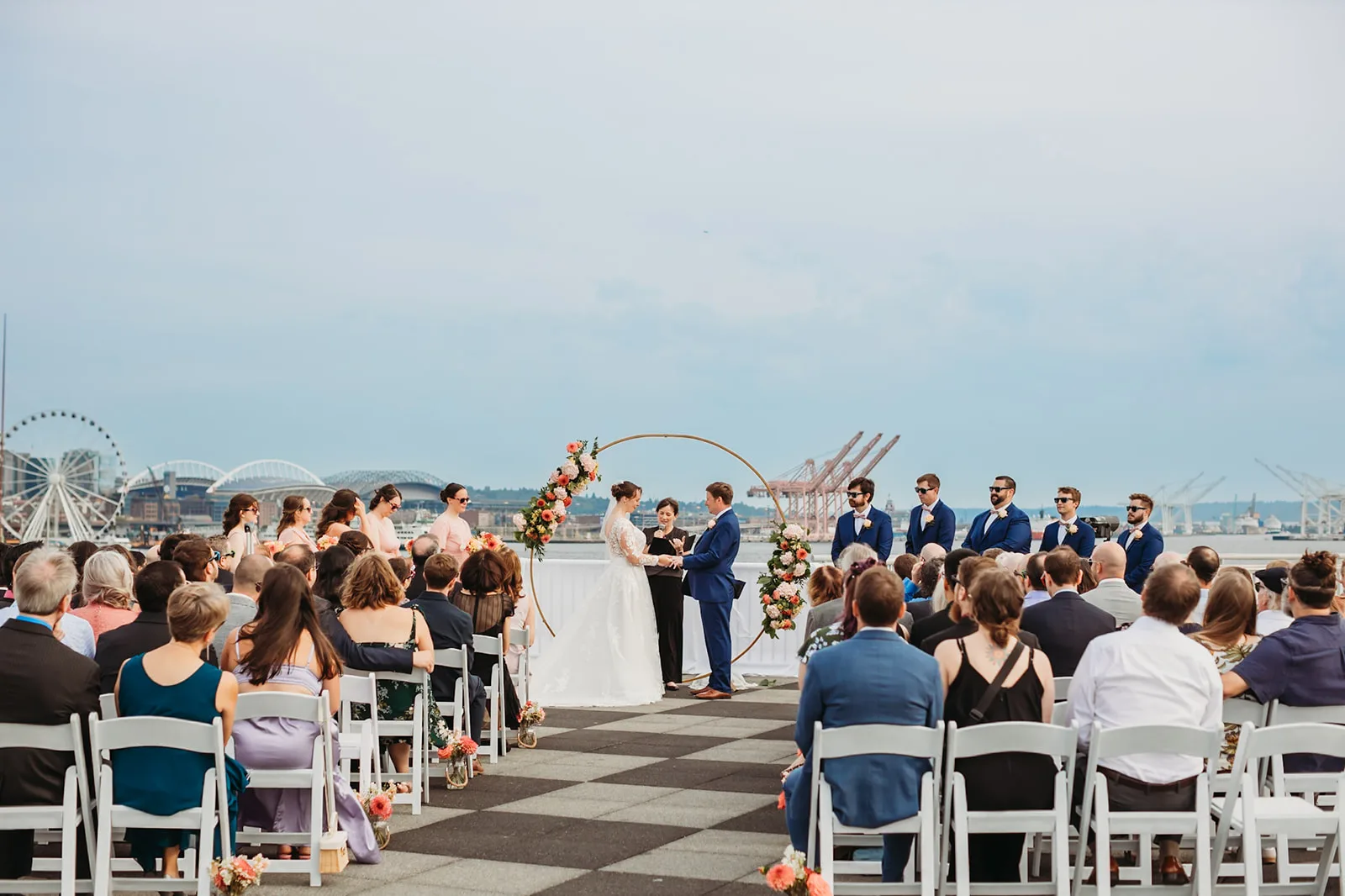 Sam and Lauren during their ceremony with wedding officiant Janie, Alder and Pine Photography