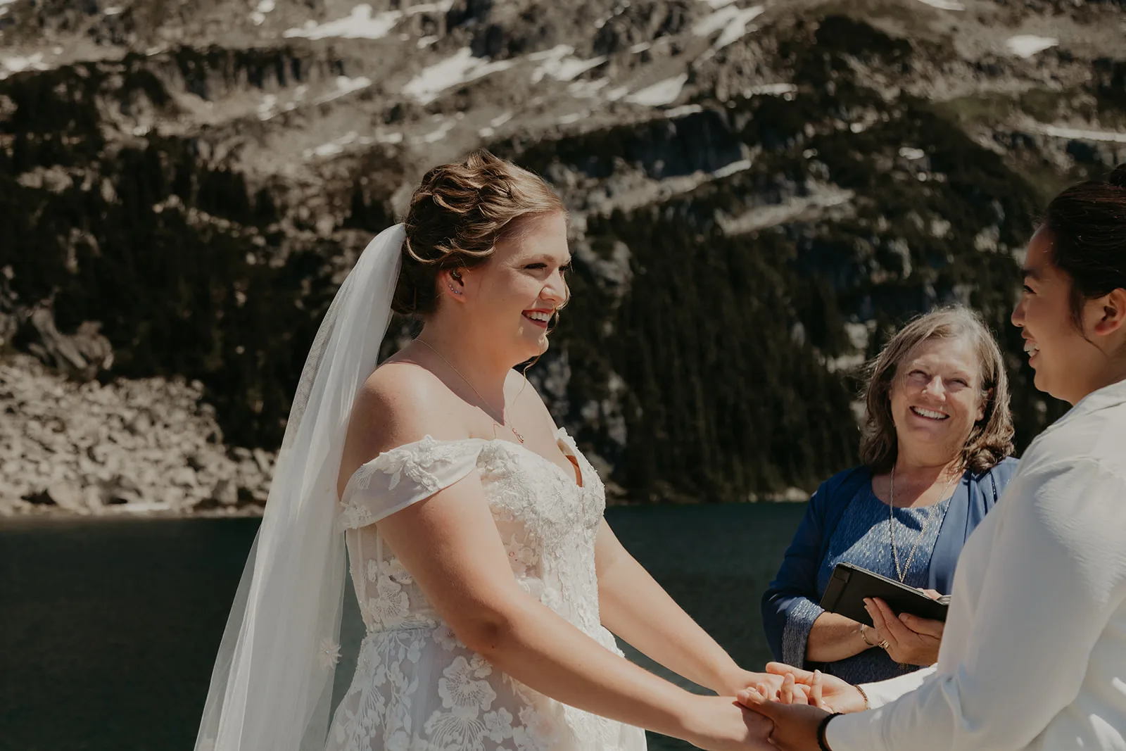 Domminique and Jasmine during their helicopter elopement with wedding officiant Rhona, Erica Miller Photography