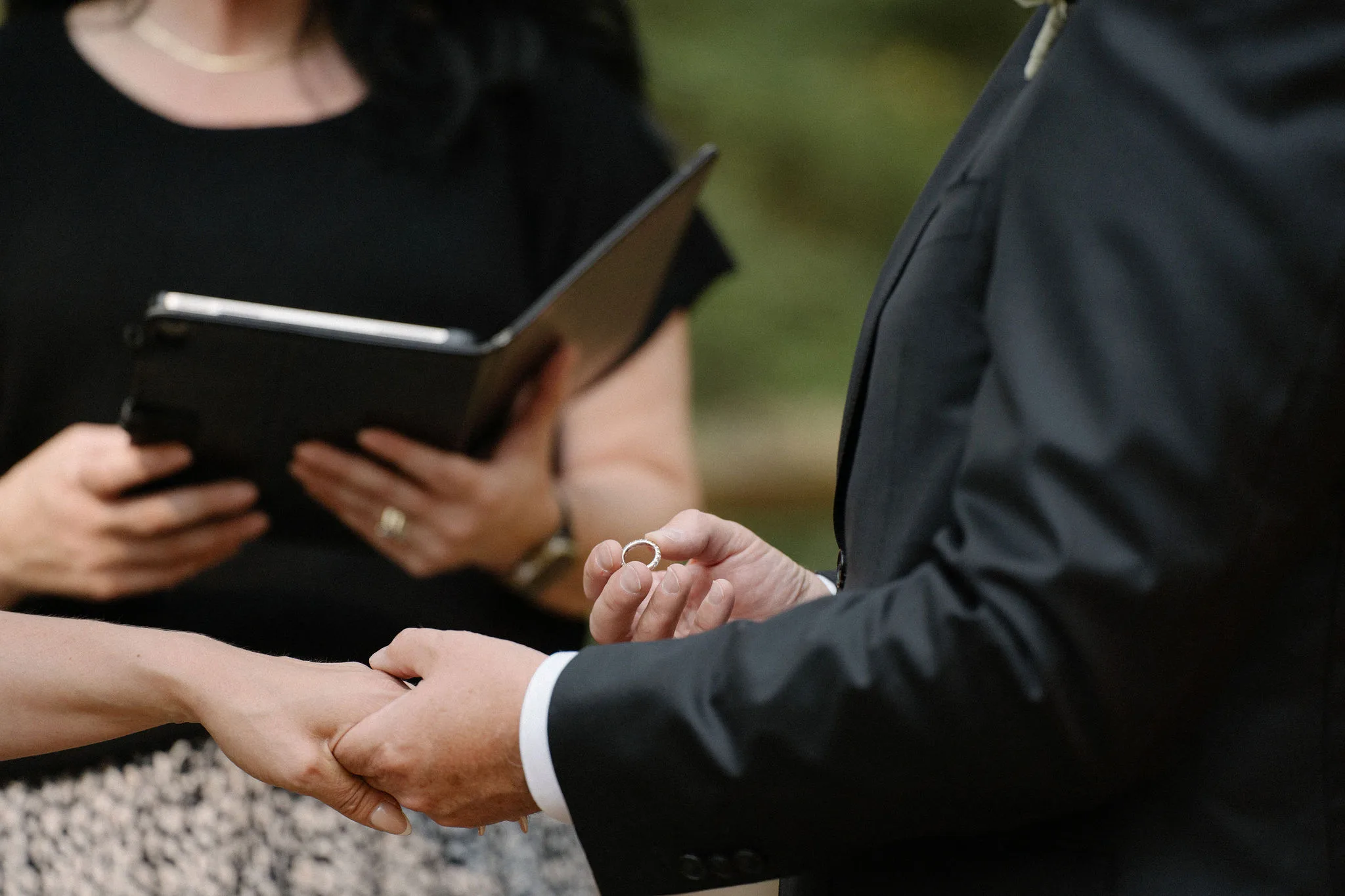 Jeff and Kendall exchanging rings during their elopement with Young Hip & Married, Clint Bargen Photography