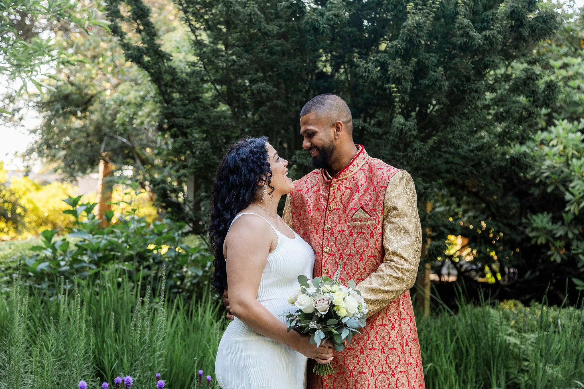 Chanice and Matthew posing for portraits on their wedding day, John Bello Photography