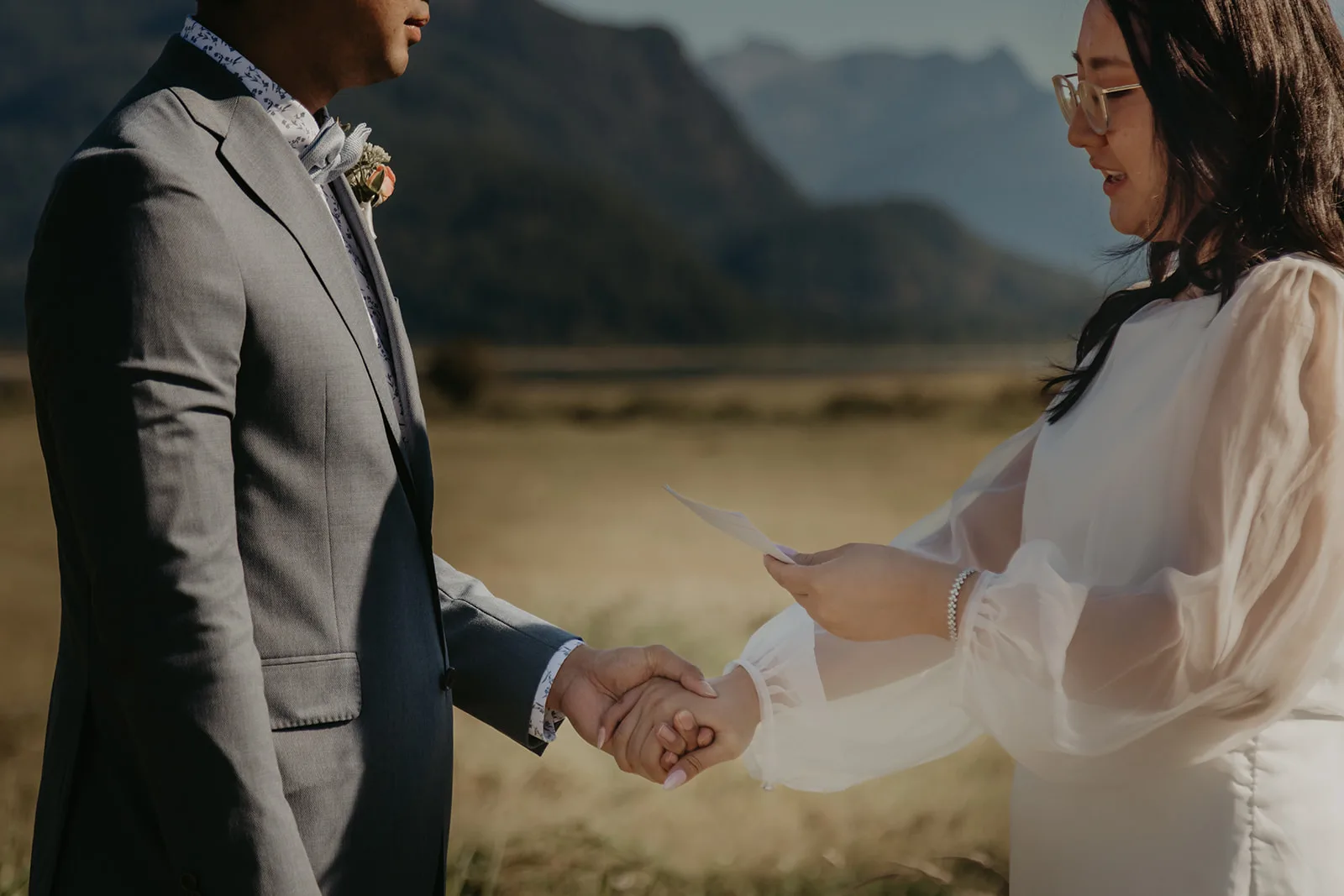 Molly and Ken exchanging vows at their intimate elopement, Erica Miller Photography