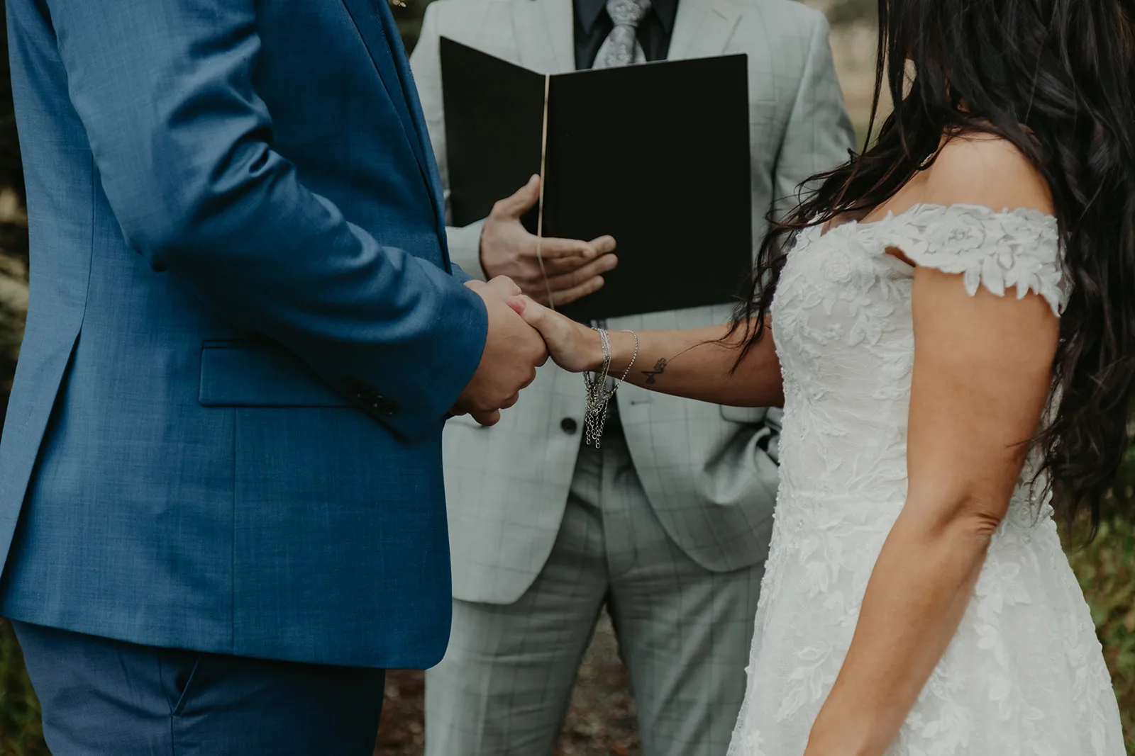 Ariana and Bruce exchanging vows at their Young Hip & Married elopement, Erica Miller Photography