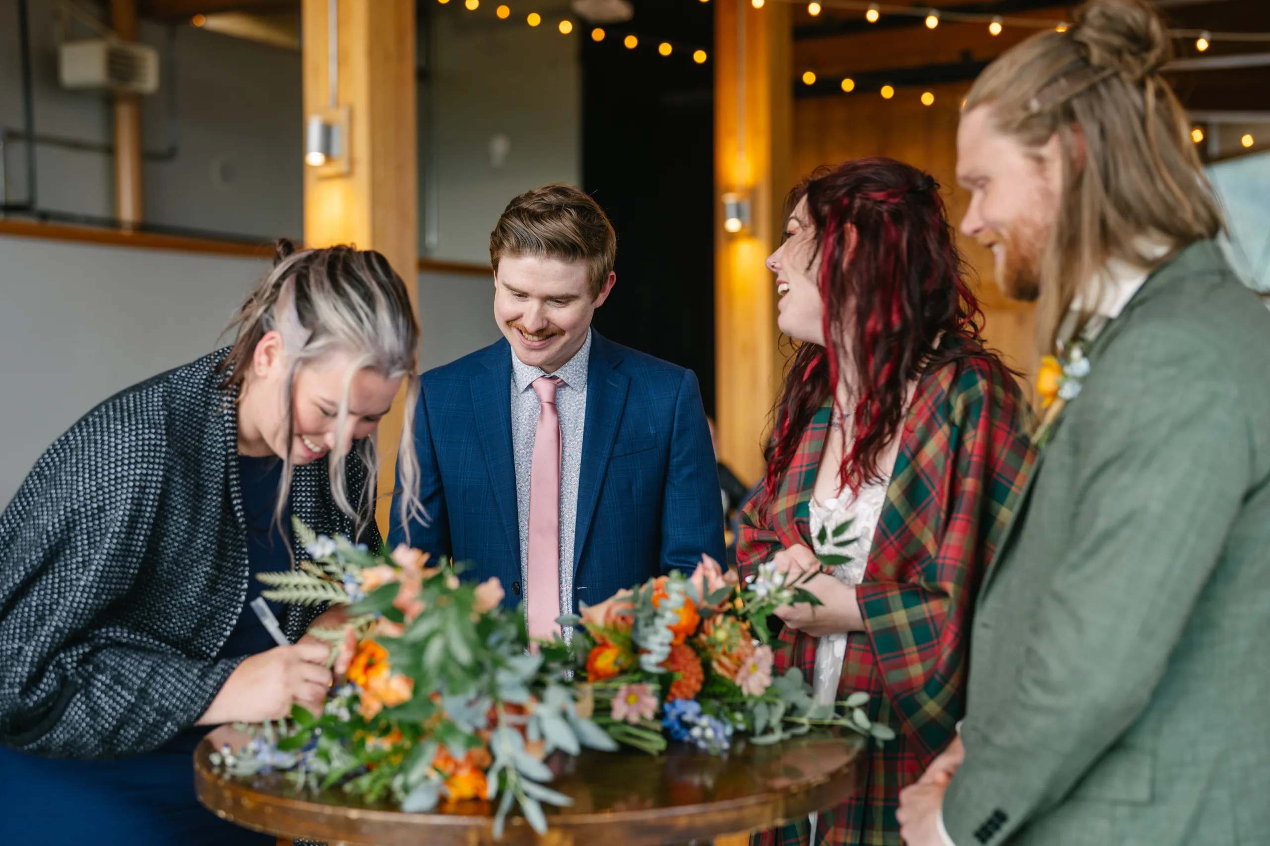 Witnesses sign the marriage licence at CJ and Andrew's wedding, Pear Tree Photography