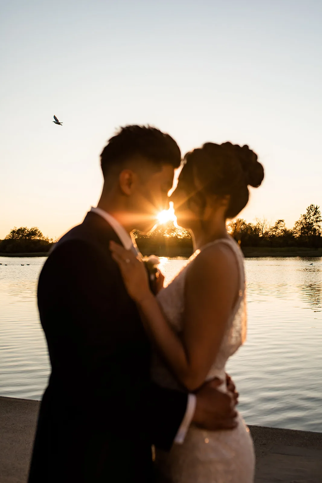 Alfred and Rhonda embracing each other during a sunset photo session, Esther Moerman Photo