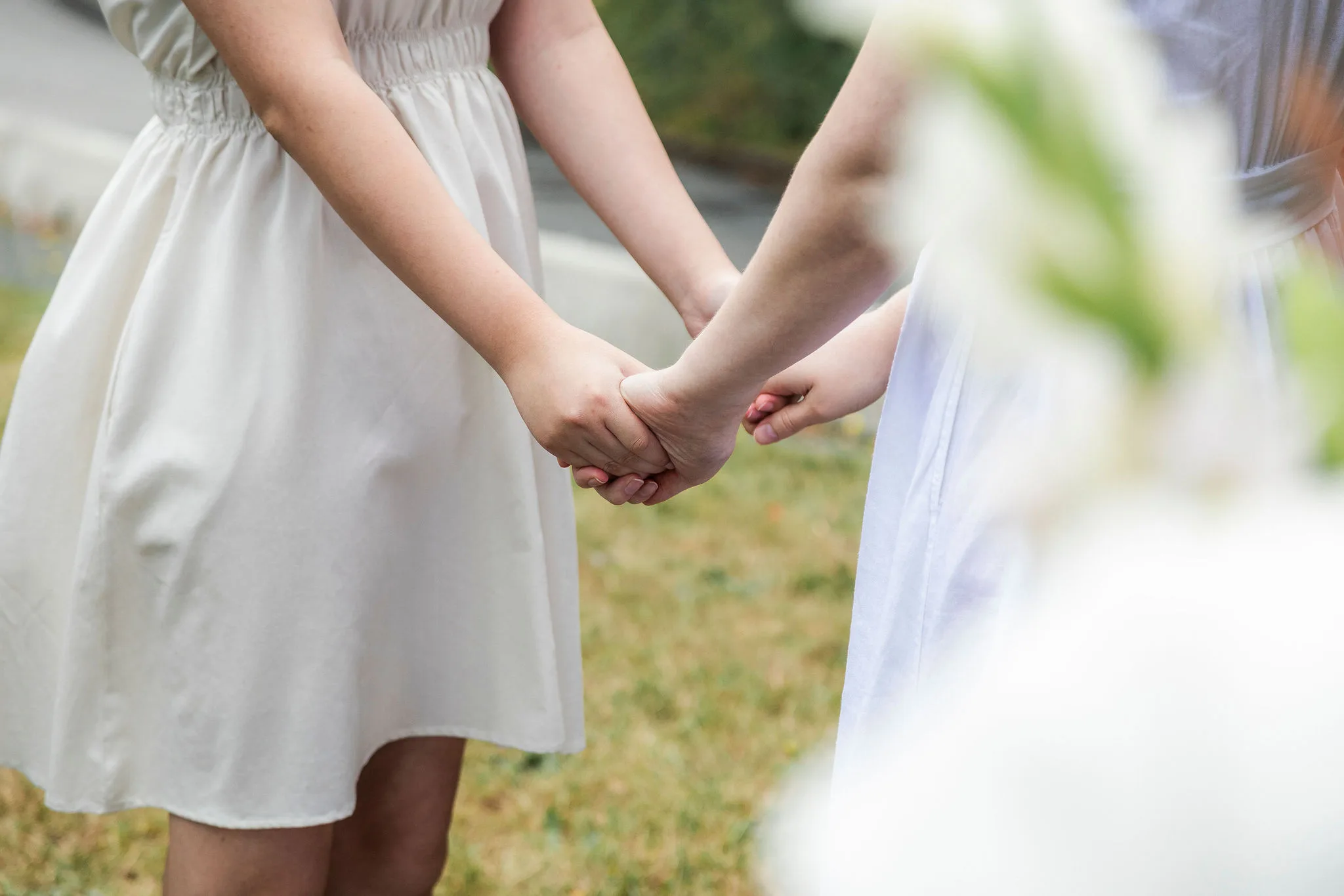 Gwen and Ashley holding hands at their Vancouver elopement, John Bello Photography